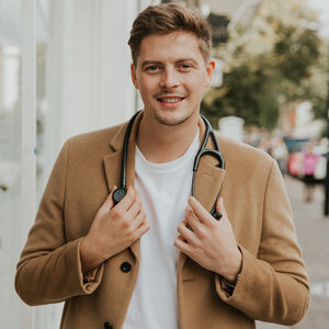 Headshot of Dr Alex George