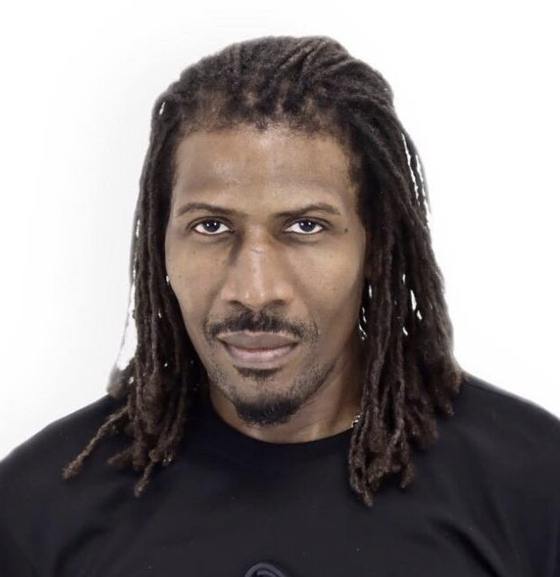 Headshot of MC Bushkin
