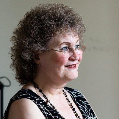 Headshot of Christine Burns MBE